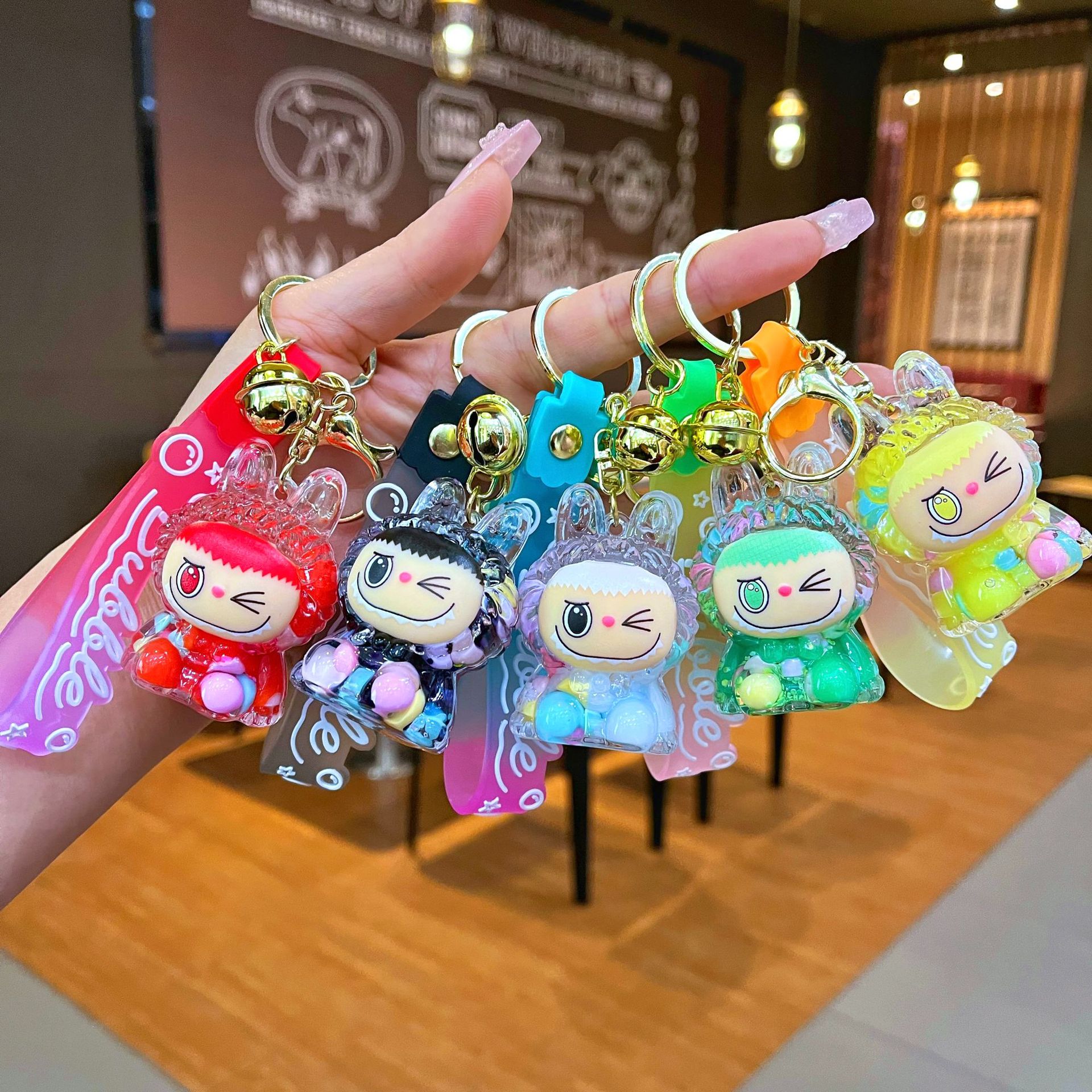 Red red acrílico tela pequeña arena flotante llavero lindo muñeca caja ciega adornos bolsos colgantes regalo llavero