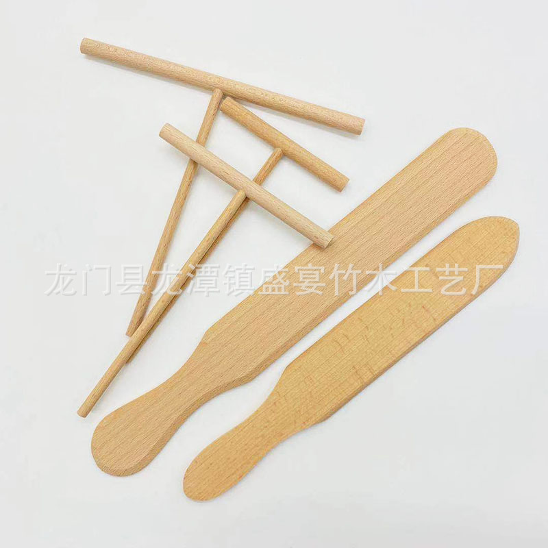 卵焼きの木の熊手の果実の屋台のパンケーキの木の熊手の木の押し棒の木のシャベルの卵の餅の屋台のパンケーキは押します。|undefined