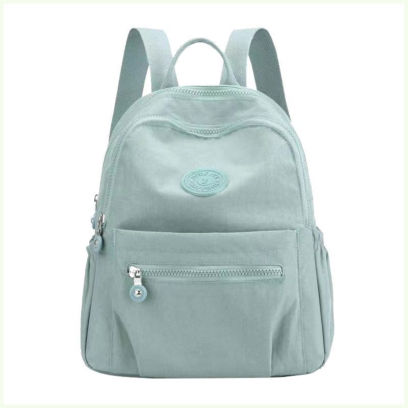 Moda coreana de tela de Oxford ligera de madres de mediana edad madre simple mochila de lona simple mochila de estudiantes