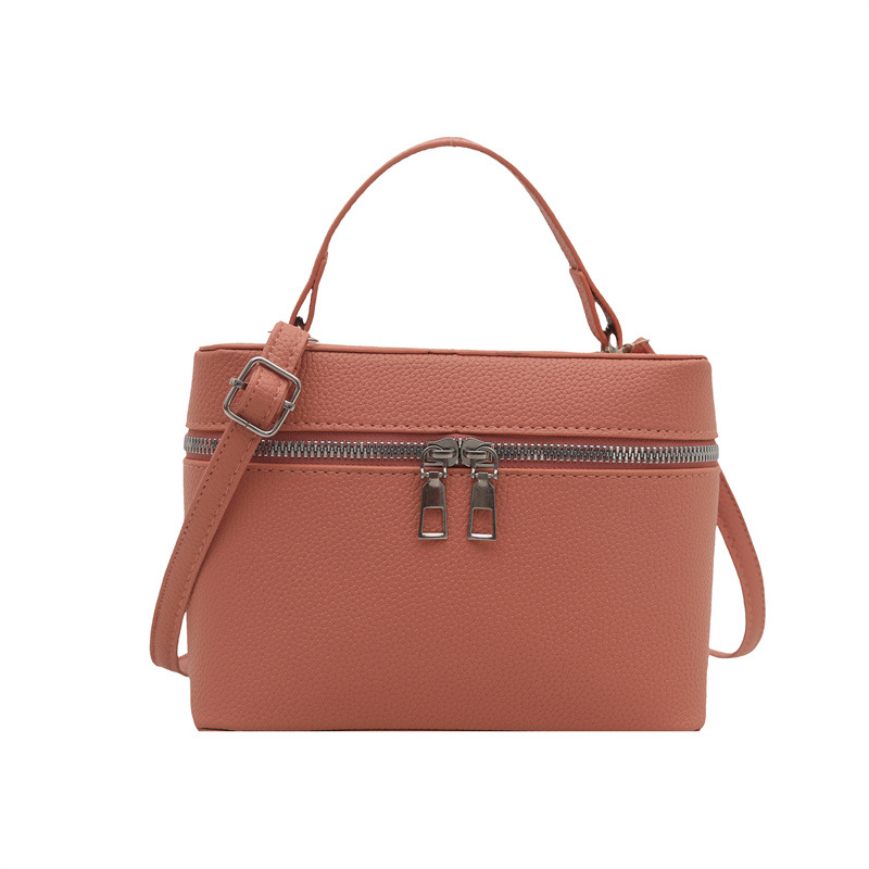 Bolsos para mujer nuevo estilo 2025 primavera nicho todo-fósforo bolso de mensajero de moda de hombro patrón de lichi bolso de cubo de lujo ligero