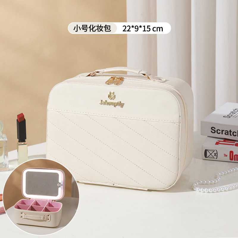 Nueva bolsa de cosméticos con lámpara LED de gran capacidad ins caja de almacenamiento de recuerdos de alta calidad maleta de viaje portátil