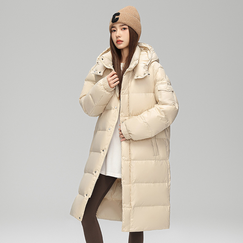 Chaqueta de plumón largo caliente estilo americano chaqueta de moda con capuchón suelta hombre explosión gruesa chaqueta de moda