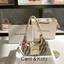 一件代发时尚百搭编织腋下包包2024小众时尚单肩月牙包批发