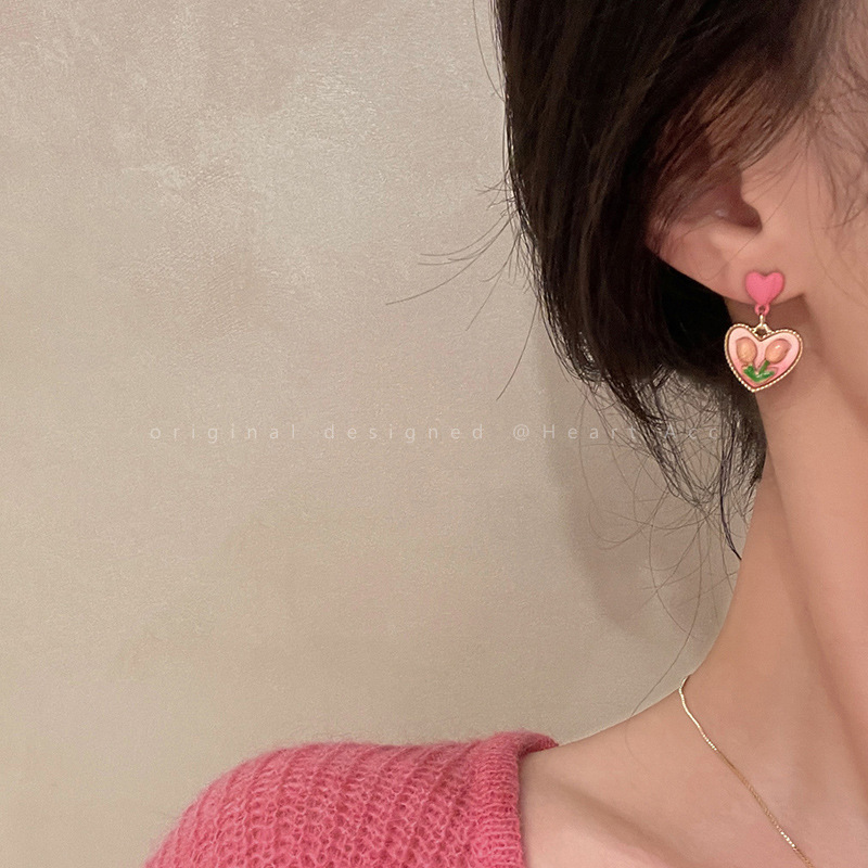 Diseño de nicho de alta gama borla larga sin orejas clip de oreja elegante estilo occidental de las mujeres cara-mirando pequeños nuevos pendientes de moda