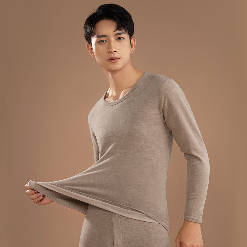 Nueva ropa interior térmica de los hombres de fondo delgado desgaste sin costuras cuello redondo ropa de otoño color sólido ropa de otoño pantalones largos traje de los hombres