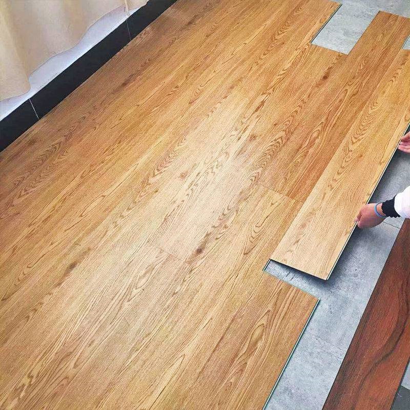 锁扣石塑地板仿复合地板家用卧室加厚耐磨木纹地板