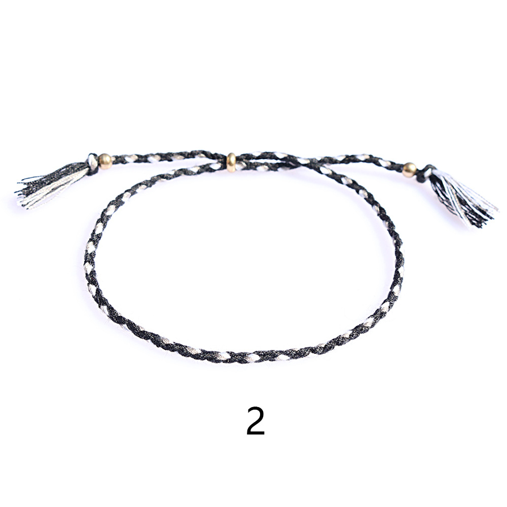 Amazon popular colorido cuerda de algodón amistad pulsera perlas de cobre borla pulsera tejida a mano ajustable hombres y mujeres pulsera