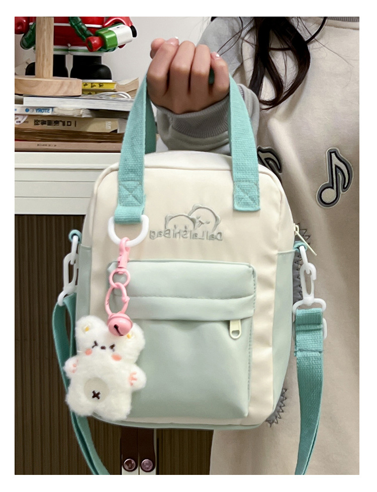 A Japanese niche double-sided multi-purpose bag for girls, a fresh and cute student single-shoulder bag, versatile carrying bear, +3 yuan undefined