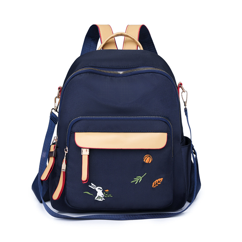 2024 nueva mochila para mujer, mochila de bordado de ocio de gran capacidad, mochila de viaje de viaje de nailon ligero al por mayor