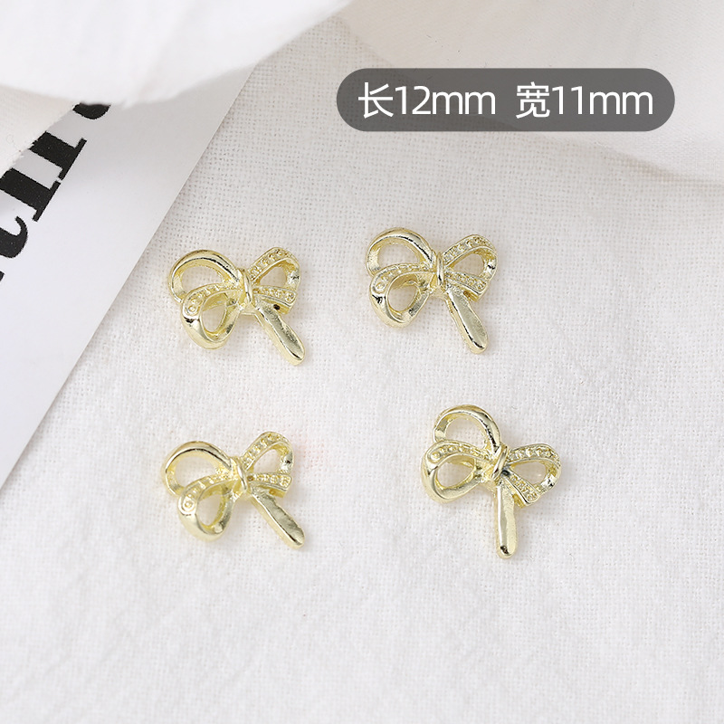 Nueva joyería de uñas, lazo, pajarita de lujo ligero, accesorios de uñas de aleación, accesorios de diamantes de uñas de celebridades de Internet tridimensionales, estilo caliente