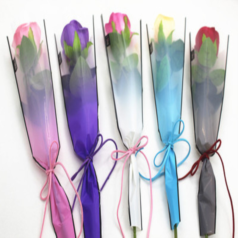 厂家批发带胶三角袋 时尚创意OPP礼品袋 定 制透明圣诞糖果袋现货