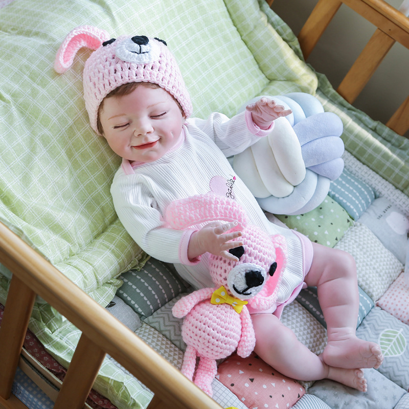 22 pulgadas rebornApril simulación bebé renacido muñeca suministro de comercio exterior WISH AliExpress entrega de una sola pieza