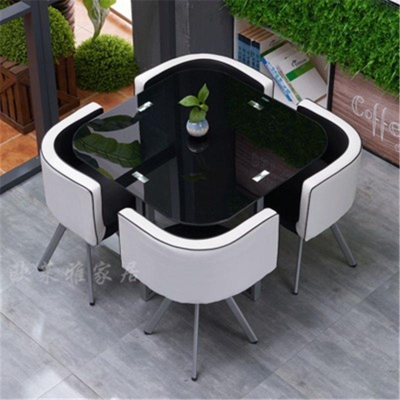 Mesa y sillas de comedor modernas, mesa redonda pequeña de vidrio templado, mesa y sillas para recepción y negociación, una mesa y cuatro sillas, cocina de inducción.
