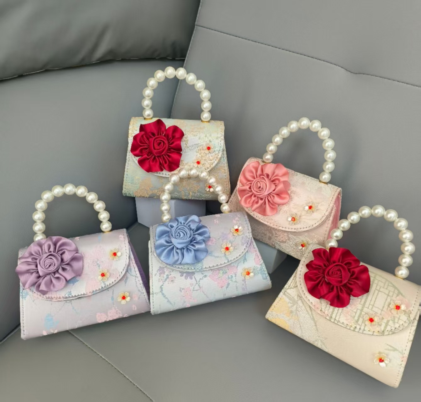 Bolsa portátil de la princesa de perlas estilo nacional arco de hombro bolso de cadena bolso pequeño bolso de cambio de Año Nuevo