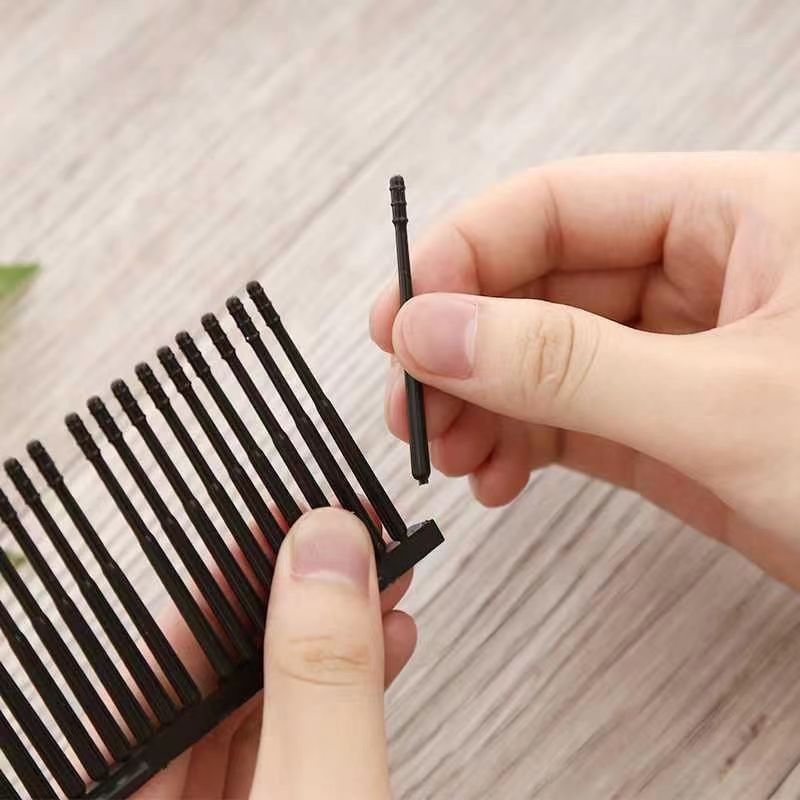 Japanese ear-cleaning device with sticky ear scoop, disposable ear cleaning stick with adhesive, earwax removal tool