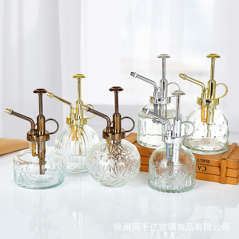 Wholesale New Retro Embossed Sunflower Transparent Glass Small Watering Can Press Gardening Watering Kettle for Home Use