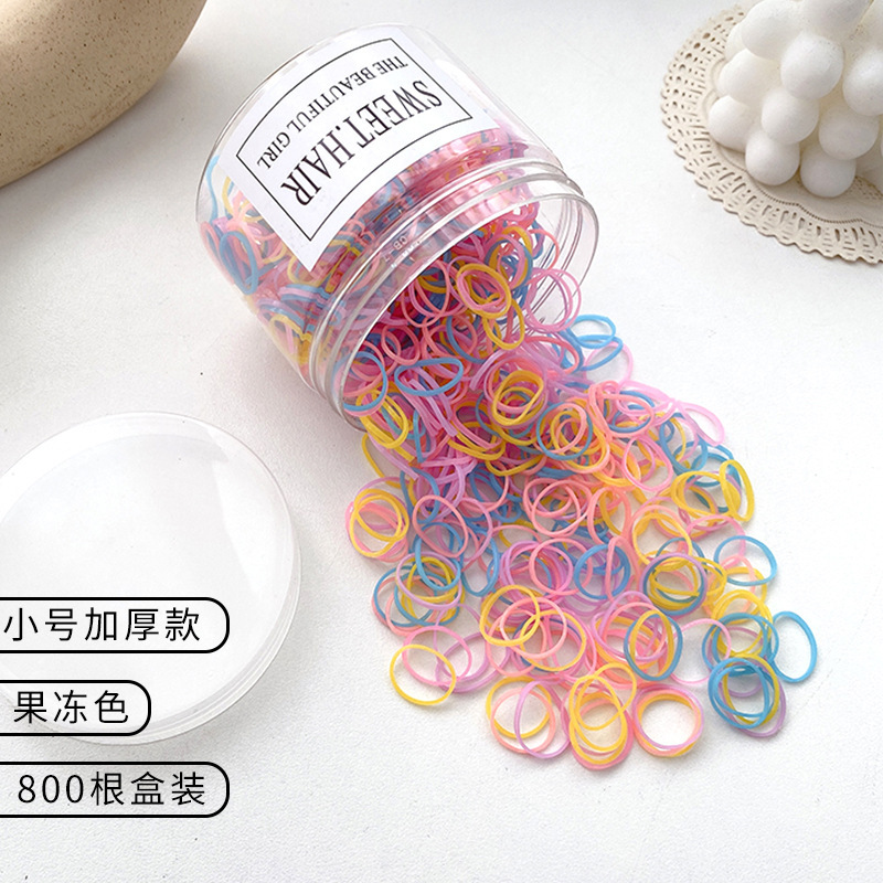 El cabello del bebé está atado, la banda elástica alta, la banda elástica desechable, la trompeta de color para niños no daña el cabello, la banda elástica pequeña