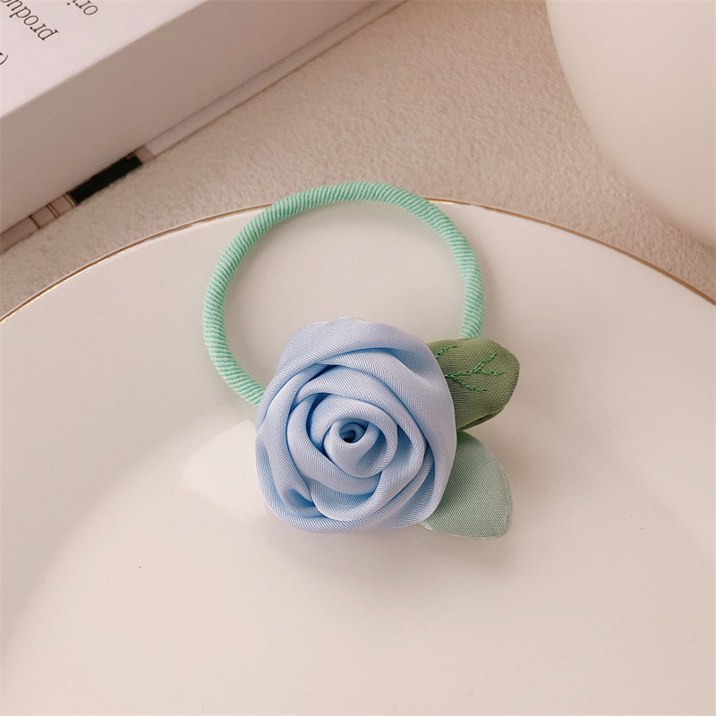 Historia de rosa amarilla coreana flor anillo de cabello cuerda de cabeza de alta sensación suave dulce camellia cuerda de cabello correa tocado