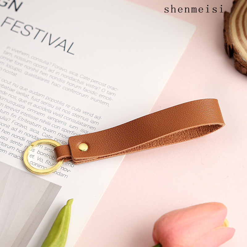 Keychain de cuero pu transfronterizo estilo simple de mano hebilla de cuero logotipo imprimible colgante de cuero llavero para hombres y mujeres