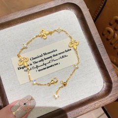 ヴィンテージの中古風な糸のアイリスの花はダイヤモンドのブレスレットを入れて軽くて豪華な大衆の設計の高級で精巧な気質の手飾りを入れます。