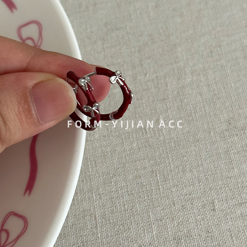 Small sophisticated cute elegant fashionable trend earrings with bow