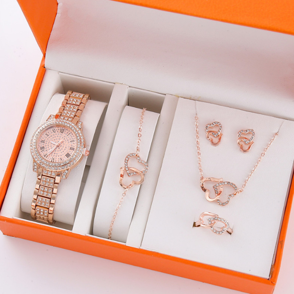 Nuevo producto para mujer 5pcs/set moda de nicho todo fósforo falso traje de reloj de cuarzo con cinturón de acero de tres ojos