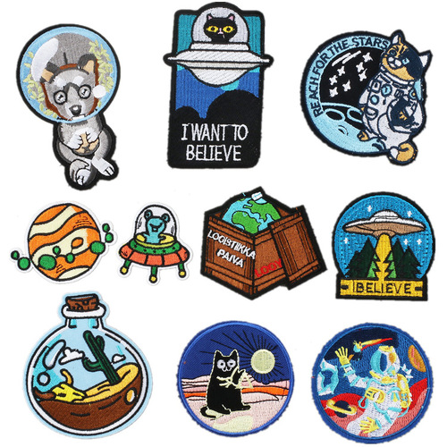 Spacecraft patch with alien astronaut embroidery badge, flying saucer design.