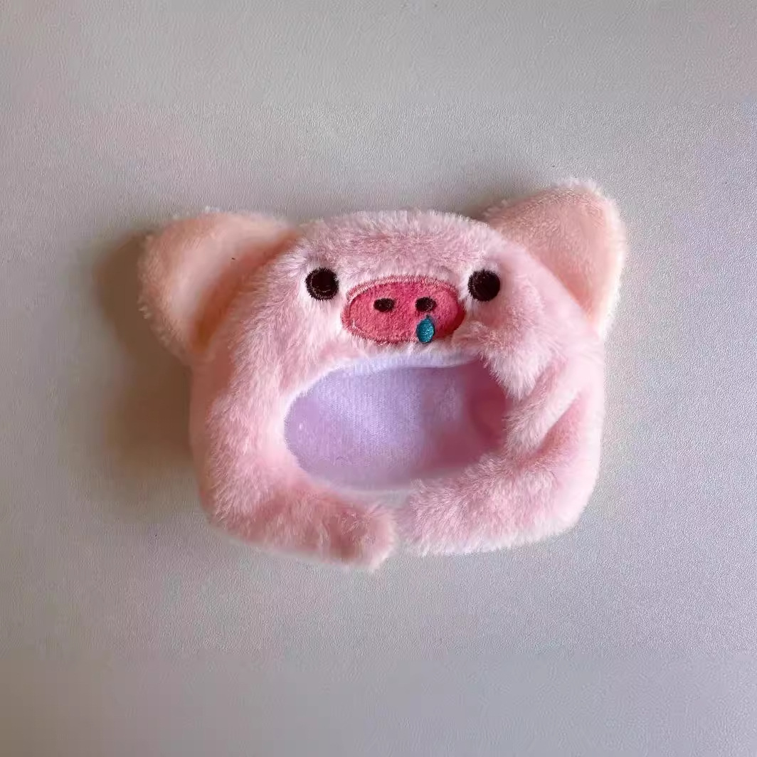 Muñeco de peluche travesti con sombrero, ropa de castor taiyaki y tocado.