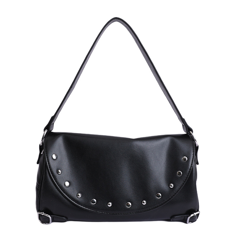 Texturas de moda primavera y verano retro bolsas de brazo 2026 nuevo estilo de este año popular remaches de hombro bolsas de tramo inclinadas