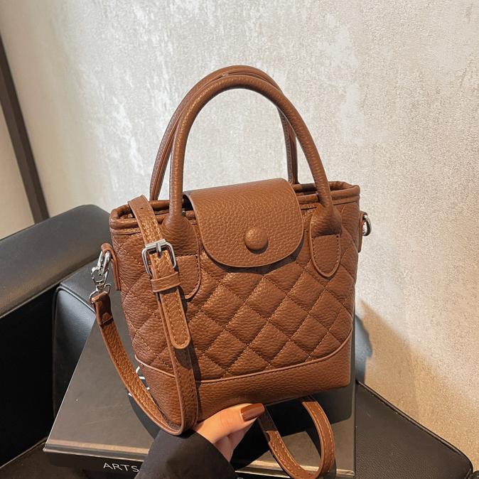 Alta sensación pequeña fragancia bolsa de cubo de mano para mujeres 2024 nuevo estilo de moda universal bolso de hombro bolsa de moda casual
