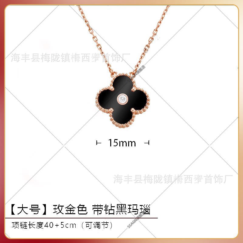 Large four-leaf clover necklace in rose gold with black onyx and diamonds in the middle