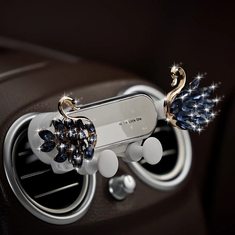 Swan drill car mobile phone bracket air outlet gravity car navigation bracket practical good car decoration