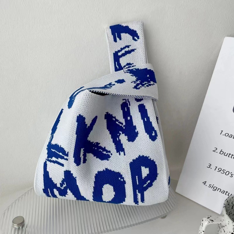 INS bolso de celebridad de Internet bolso de cubo de lana de punto para mujer bolso de mano casual bolso de mano de estilo japonés y coreano bolsa de Almuerzo