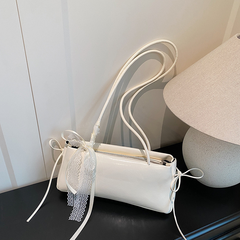Korean Niche Fashion Underarm Bag for Women 2025 New Style Simple and Stylish Bow Shoulder Bag Versatile Commuter Bag Korean Niche Fashion Underarm Bag for Women 2025 New Style Simple and Stylish Bow Shoulder Bag Versatile Commuter Bag