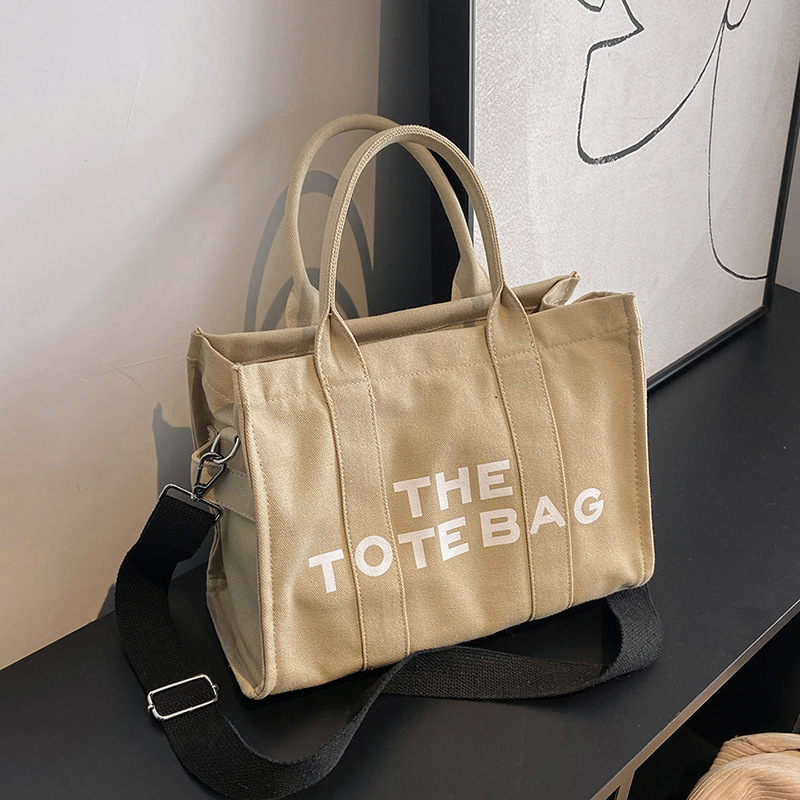 Bolso de mano para mujer, nuevo bolso práctico de lona con nudo transfronterizo, de gran capacidad, adecuado para el trabajo y los desplazamientos, se puede llevar como bolso de hombro o bandolera.