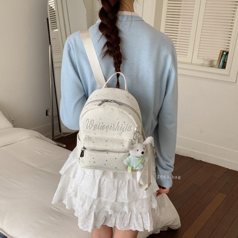 Mochila de moda mochila 2026 mochila de gran capacidad para estudiantes universitarios en clase nueva primavera bolsa de letras lienzo para mujeres
