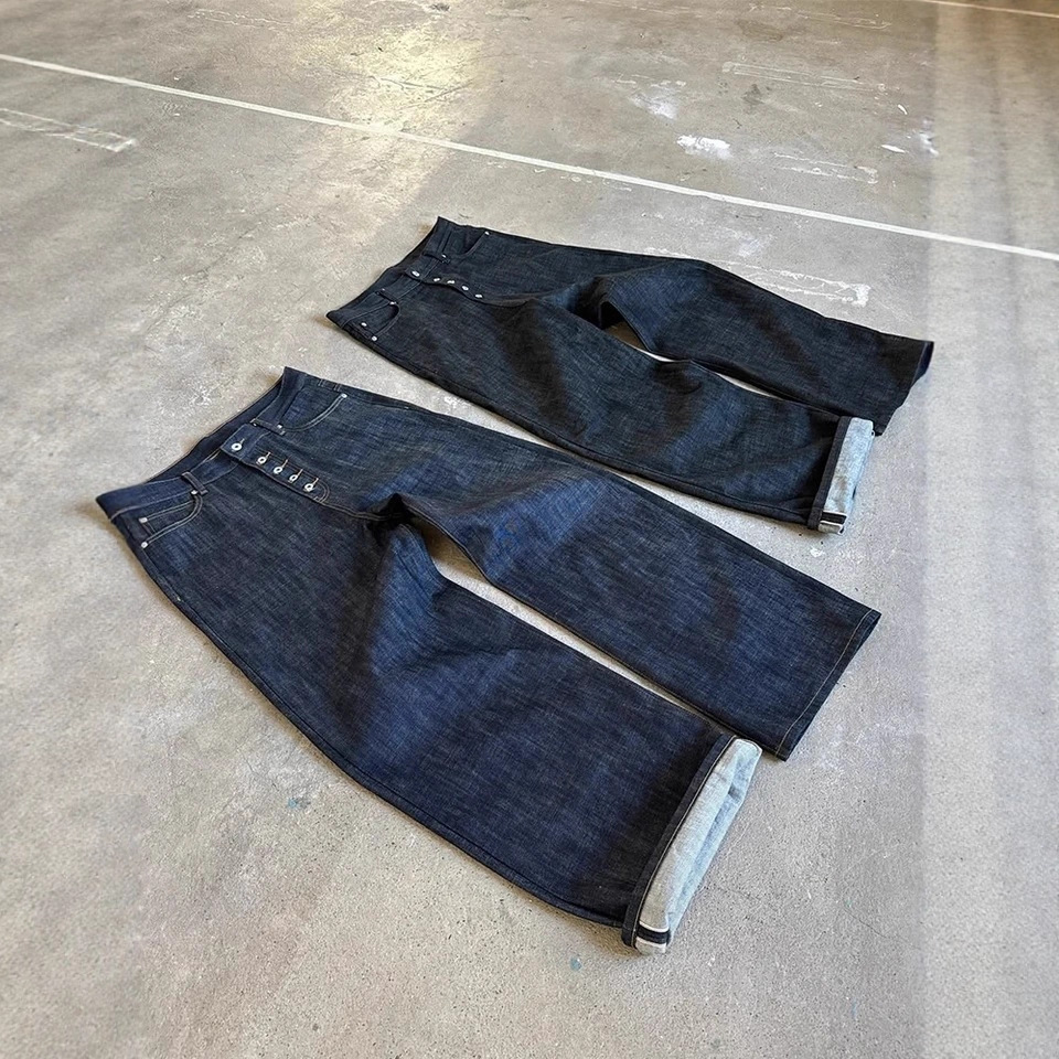 Europa y Estados Unidos transfronterizos retro estilo americano alta tendencia de la calle botones personales jeans de color sólido casual pantalones de piernas largas