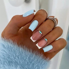 Elegant European and American Instagram-style medium-length faux nails with a French-inspired design—featuring sparkling rhinestones in sky-blue accents. Ready-to-wear nail tips for stunning, salon-quality manicures.