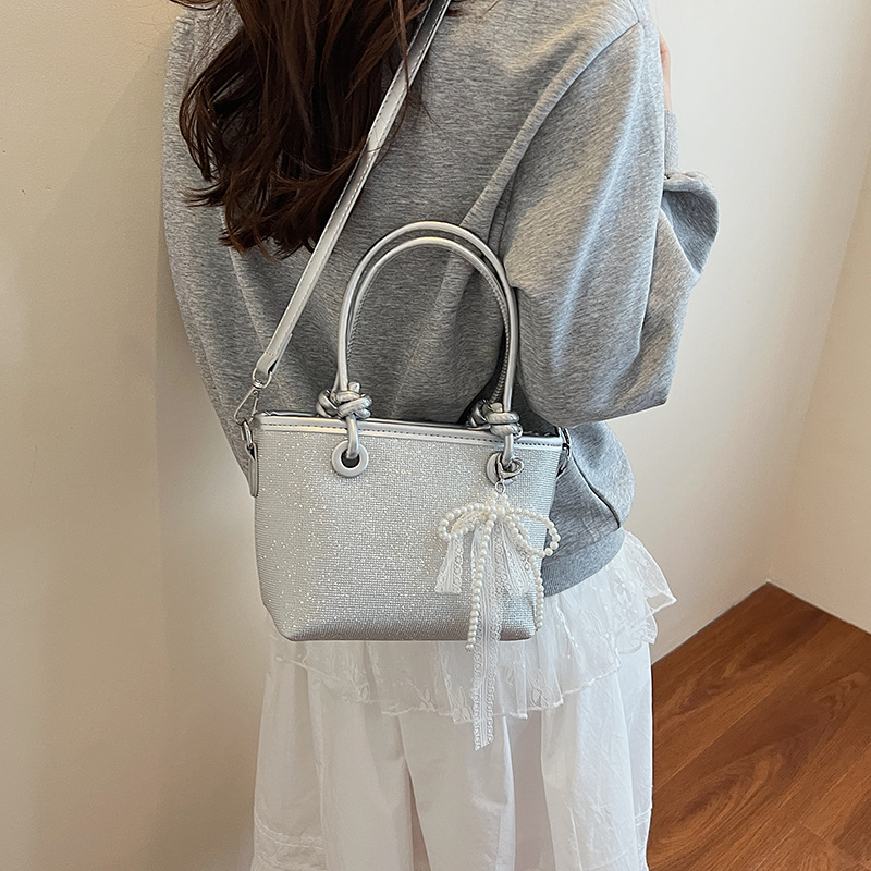 Transfronterizo coreano estilo extranjero simple bolso de cubo 2025 nuevo estilo de transporte de textura bolso de hombro de moda universal bolso de mano