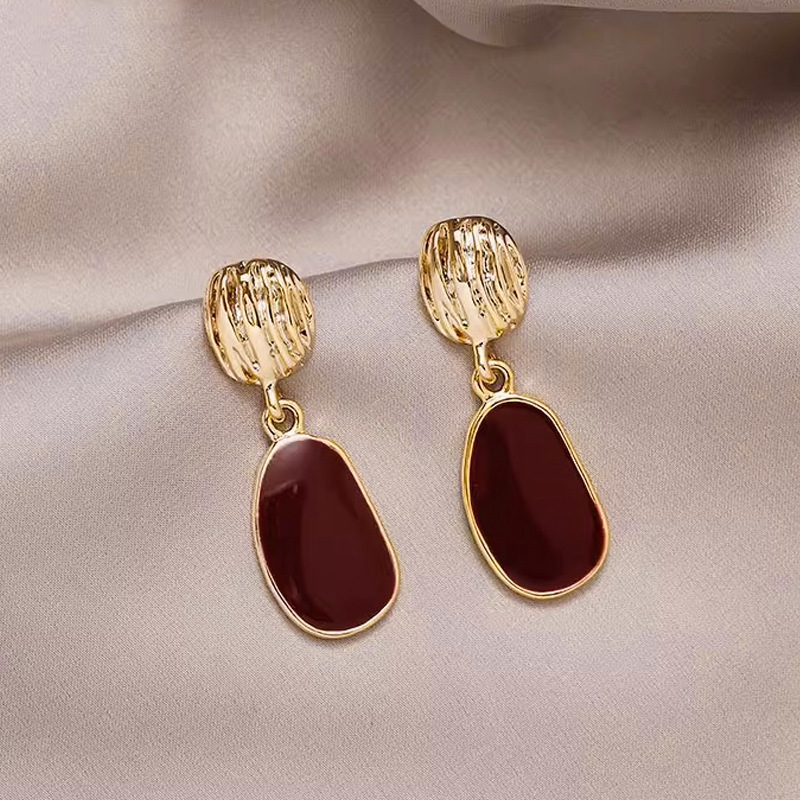 Aguja de plata de moda alta sensación de diamante de goteo de aceite pendientes nicho universal elegante pernos de orejas ligero lujoso temperamento simple orejas para mujeres