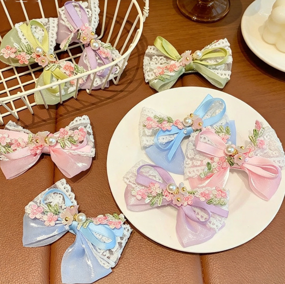 Children's hairgrip pearl with bow