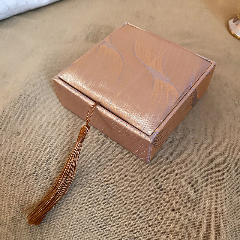 Joyería pluma borla anillo COLLAR COLGANTE pulsera caja de joyería Corea del Sur simple caja de polvo caja portátil