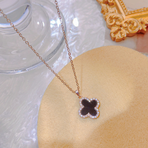 Titanium steel necklace women's 18k rose gold diamond four-leaf clover pendant niche light luxury black shell clavicle chain temperament neck necklace