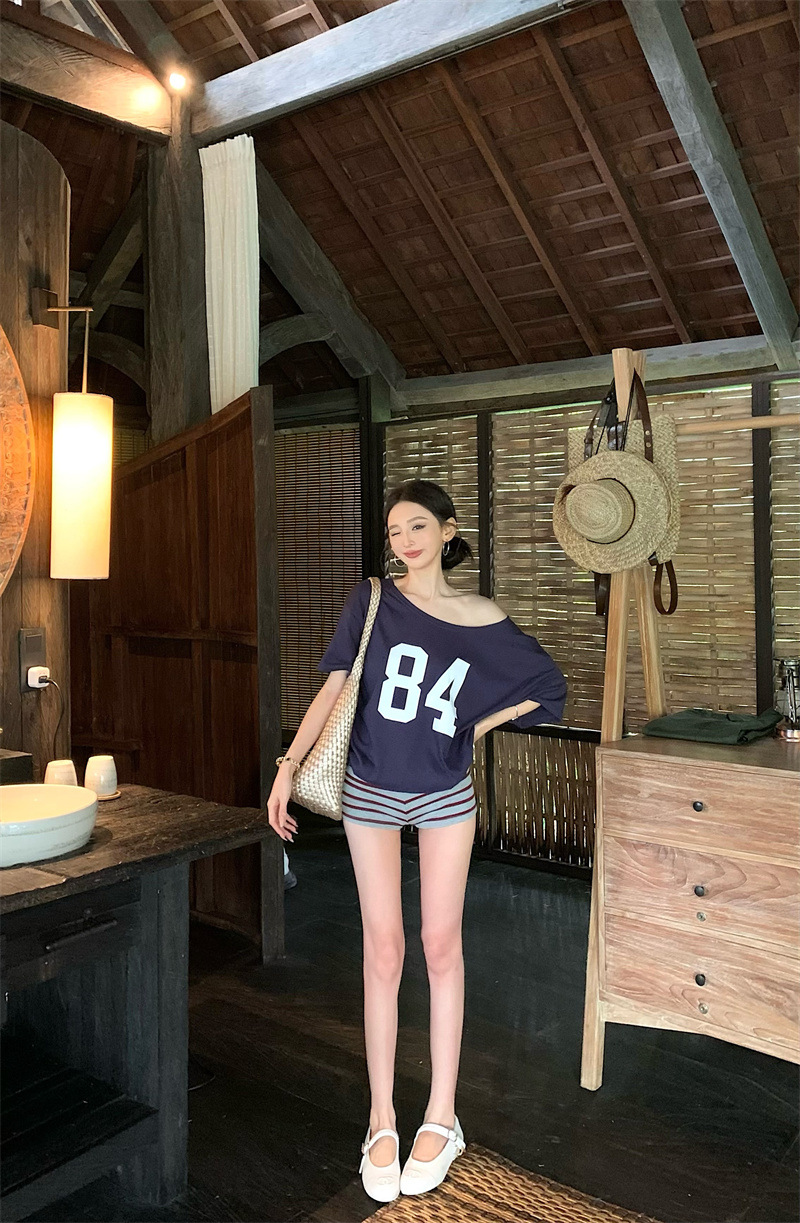Copy_Navy blue printed slanted shoulder short-sleeved T-shirt for women in summer, lazy and loose American style.jpg