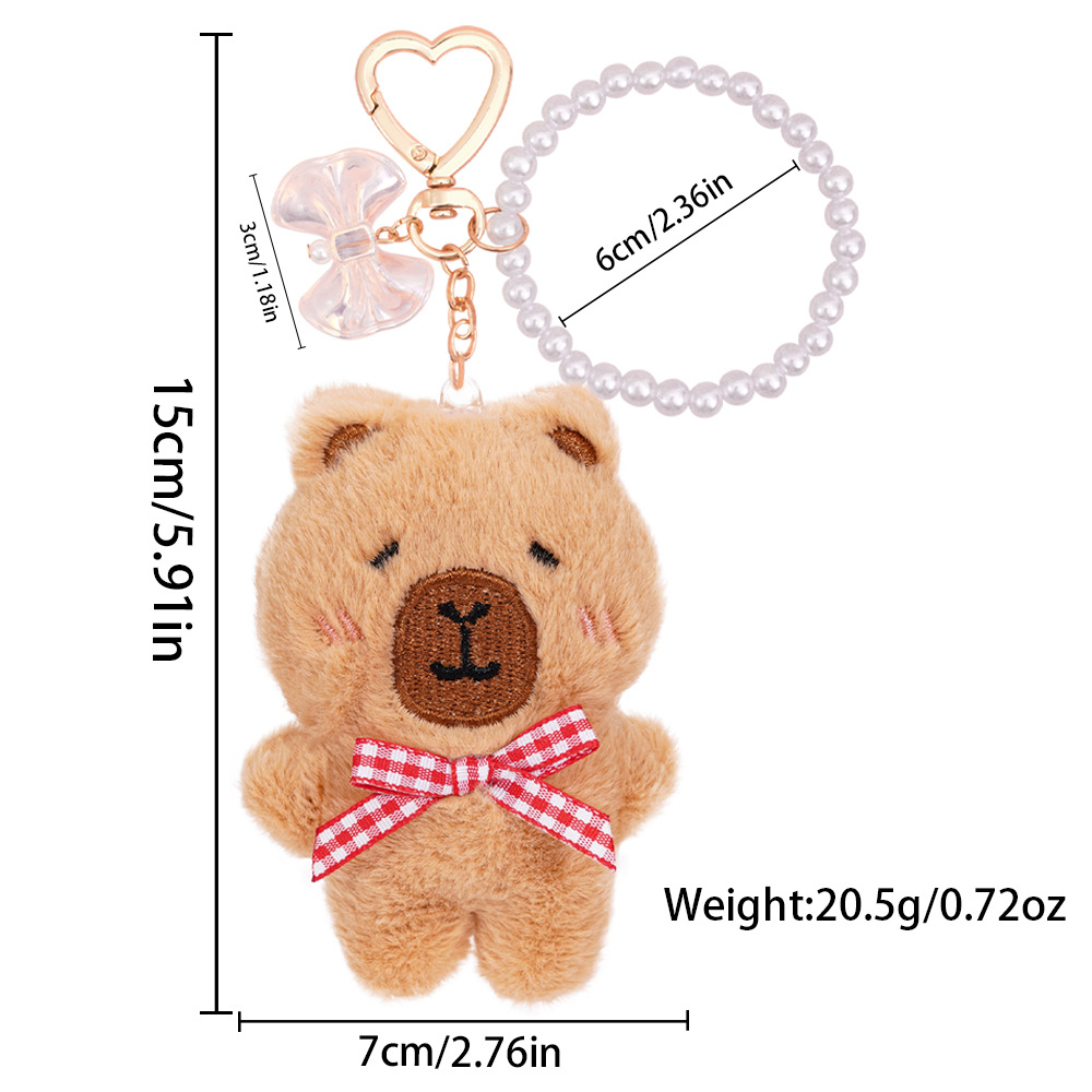 Colgante de bolso de animal de dibujos animados lindo Kapibala niña mochila llavero accesorios colgantes de perlas de felpa