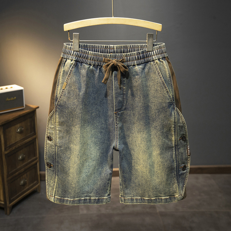 Europa y América pantalones cortos de color mezclado de jeans para hombres de verano nuevo botón empalmado cintura elástica cinco pantalones delgados medio caballo