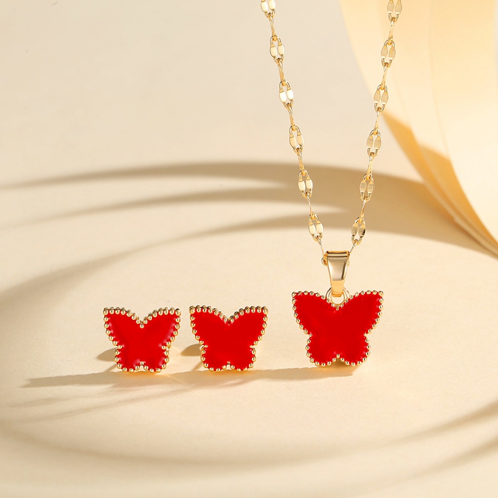 Europa y los Estados Unidos explotaron mariposa juegos de joyería de cobre dorado para mujeres pendientes de aceite goteo collar de seis colores joyerías transfronterizas en caliente