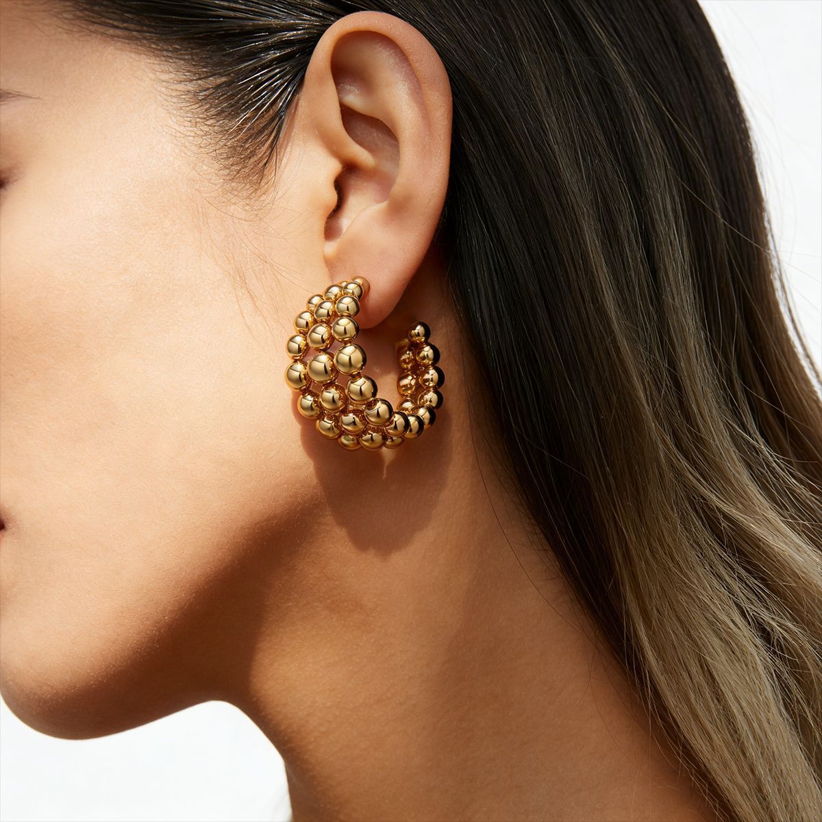 TENA Europa y América de acero inoxidable pendientes de mujer lujo ligero de alta calidad tapones de acero dorado venta caliente joyería de acero de titanio transfronteriza