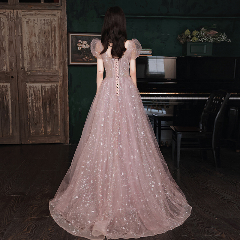 Vestido de noche con mangas abullonadas para mujer, nuevo estilo 2026, elegante, estilo bosque de hadas rosa, para fiesta, banquete, presentación.