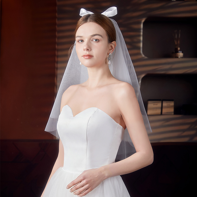 Short wedding dress with bow